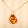 Amber like a ray of sunshine on a gold chain!
