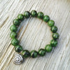 Green jade bracelet with Protection Eye charm