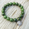 Green jade bracelet with Protection Eye charm