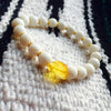 Amber, white coral & gold bracelet