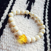 Amber, white coral & gold bracelet